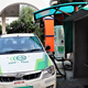 An EV commercial car being charged at a paid public charging point in Hyderabad.